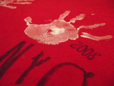 Annual Holiday Tradition: Add a handprint to a Christmas table cloth each year. A simple and adorable ongoing gift *So sweet