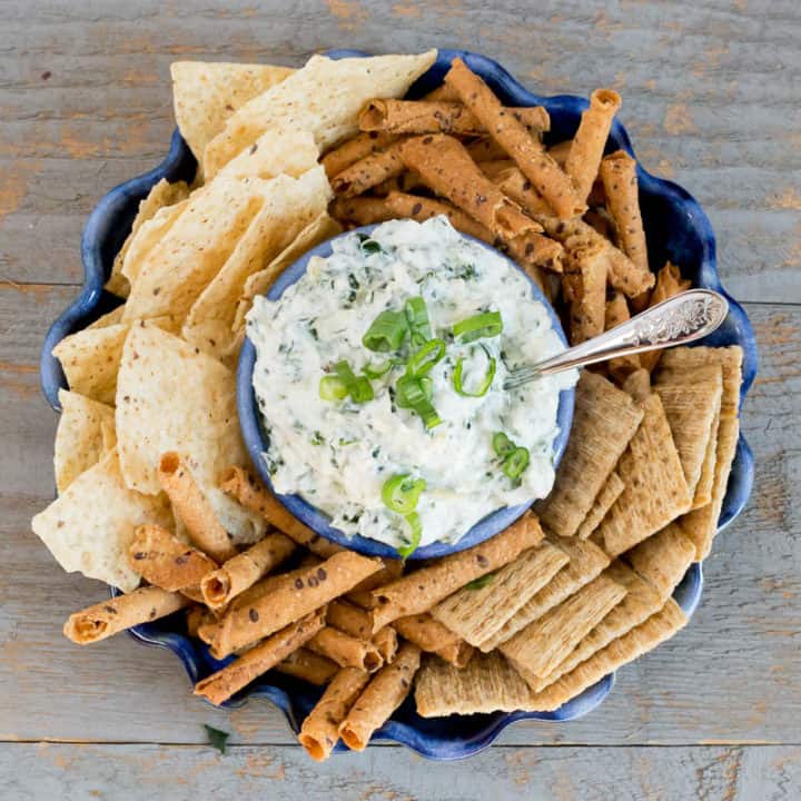 This Spicy Spinach Dip (made with Greek Yogurt) sounds insanely delicious *Pinning this for our next party