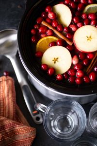 There's nothing more inviting than the aroma of hot mulled cider in the slow cooker. This simple make-ahead recipe allows you to be a good host, without pausing to offer every guest a drink upon arrival. Before guests arrive, set up a self-serve station with mugs, whipped cream, and a bit of liquor. Adult guests love the option to self-spike a delicious mulled cider!