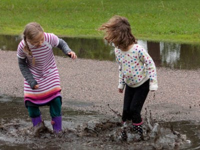 How to Get a Terrific Puddle Action Photo + Printable Spring Photo Lists! #photography #photographytips #photographylist *Love this post on how to get a great water action photo when puddle jumping with kids!
