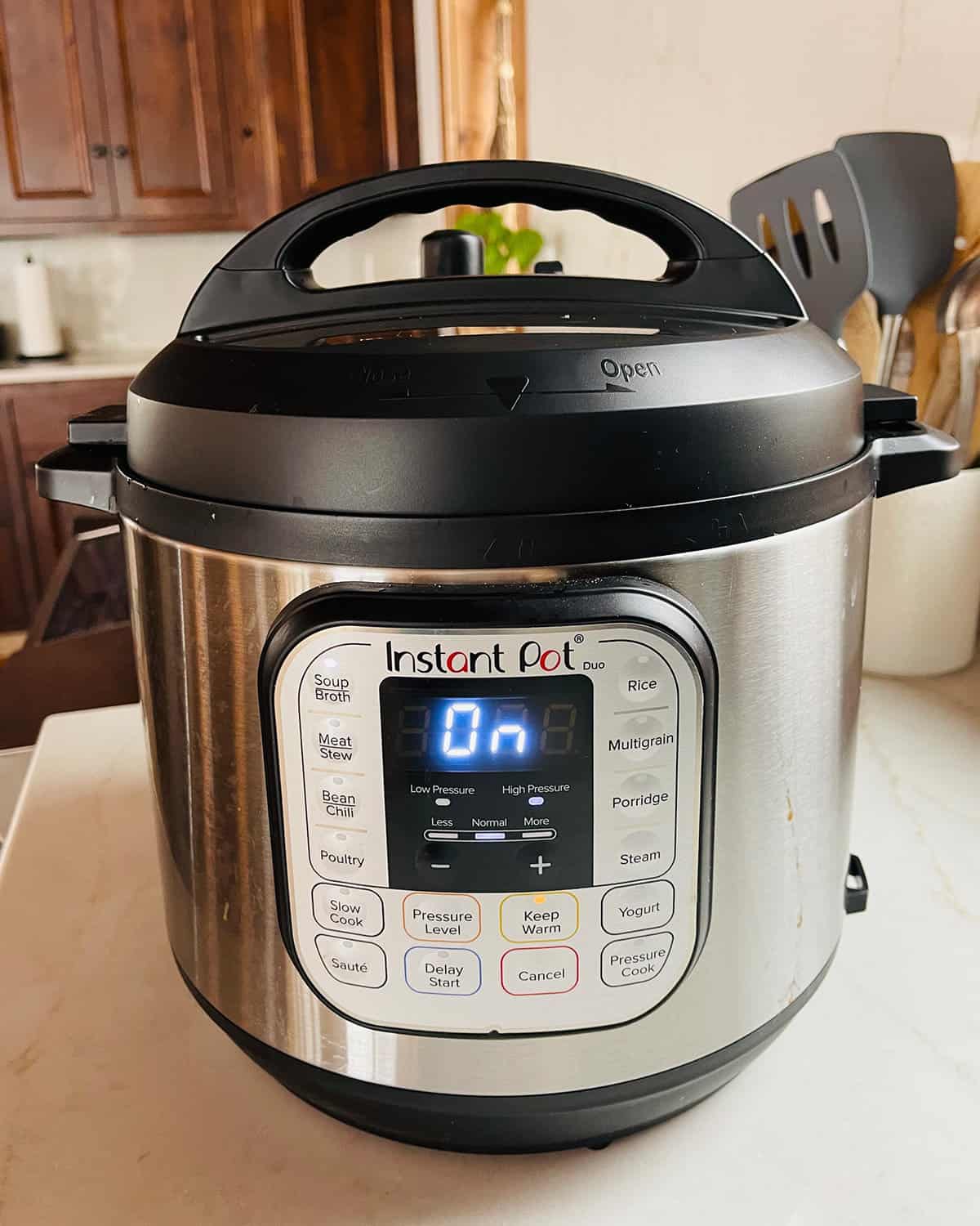 An Instant Pot sitting on the kitchen counter filled with turkey taco soup.