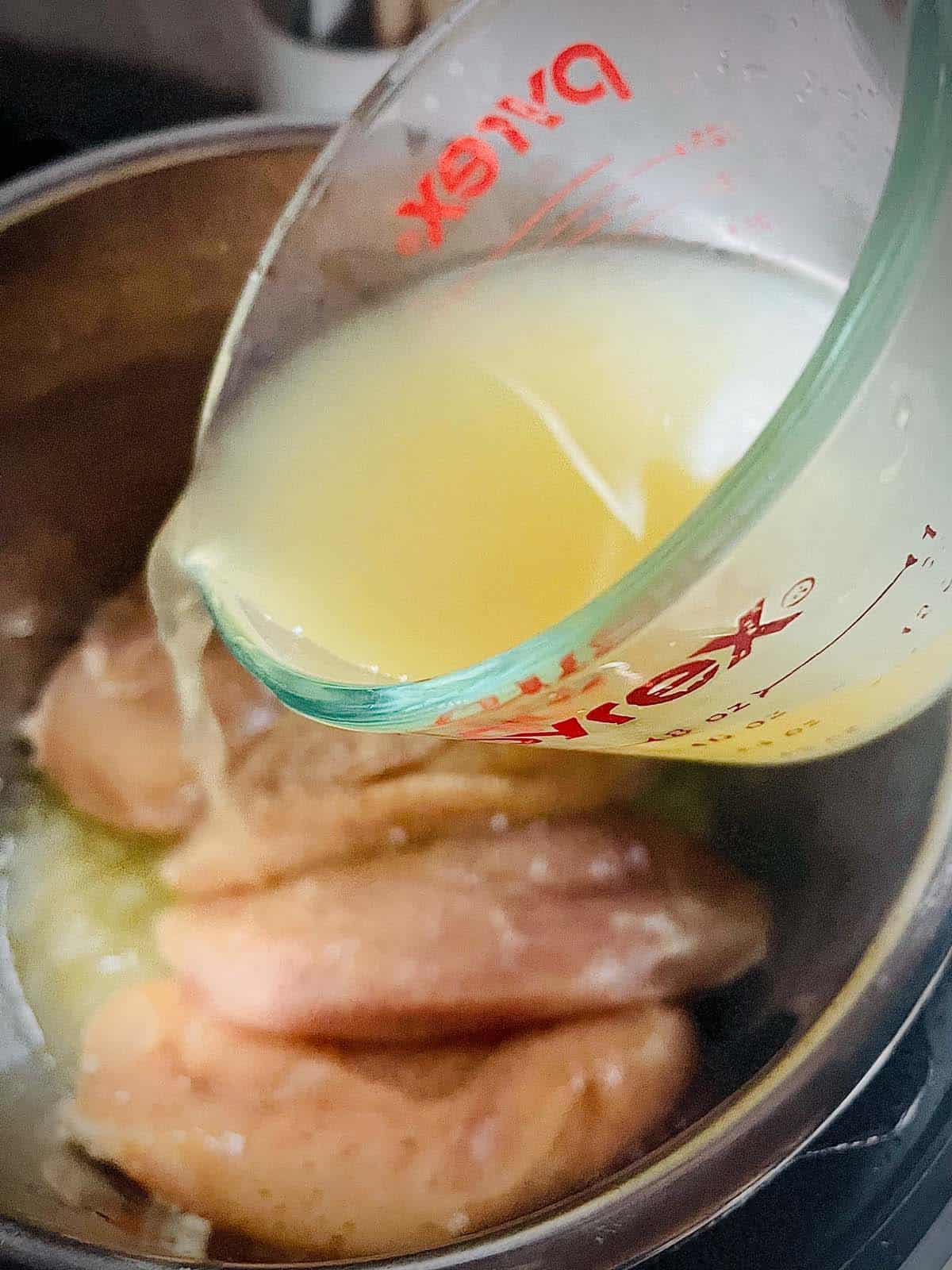When cooking chicken to freeze, adding a cup of broth to the Instant Pot ensures juicy breasts.